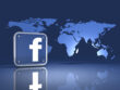 3d illustration of a facebook logo standing in front of an upright map of the world on a blue reflective surface